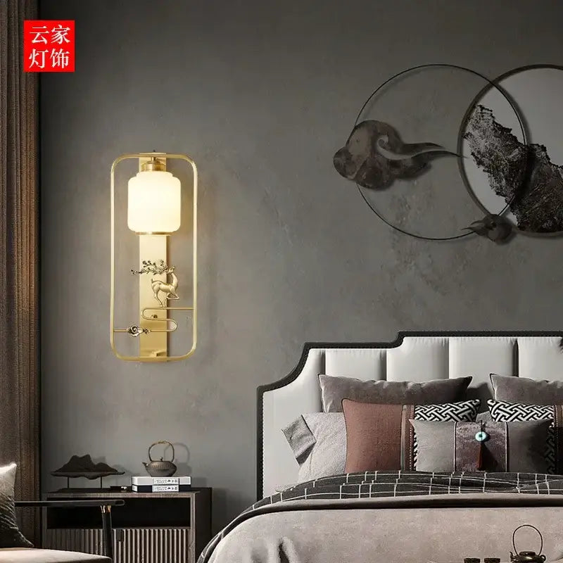 Gold-toned rectangular wall lights with frosted glass shade and ornate elk decor wall motif for modern living room decorbites elk decor