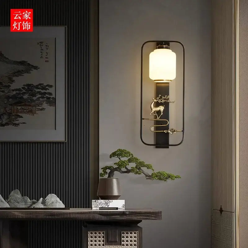 Modern black metal elk decor wall light with gold deer figurine and warm white cylindrical lampshade rectangular sconce