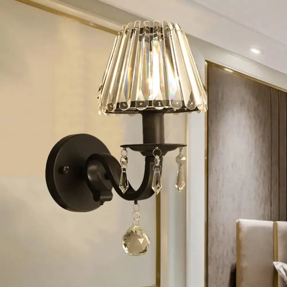 Modern black metal wall sconce with black gold finish crystal chandelier shade and dangling faceted crystals for living room