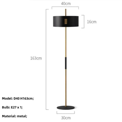 Modern black metal e27 floor lamp with gold-toned central pole and base for stylish living room decorbites black metal design
