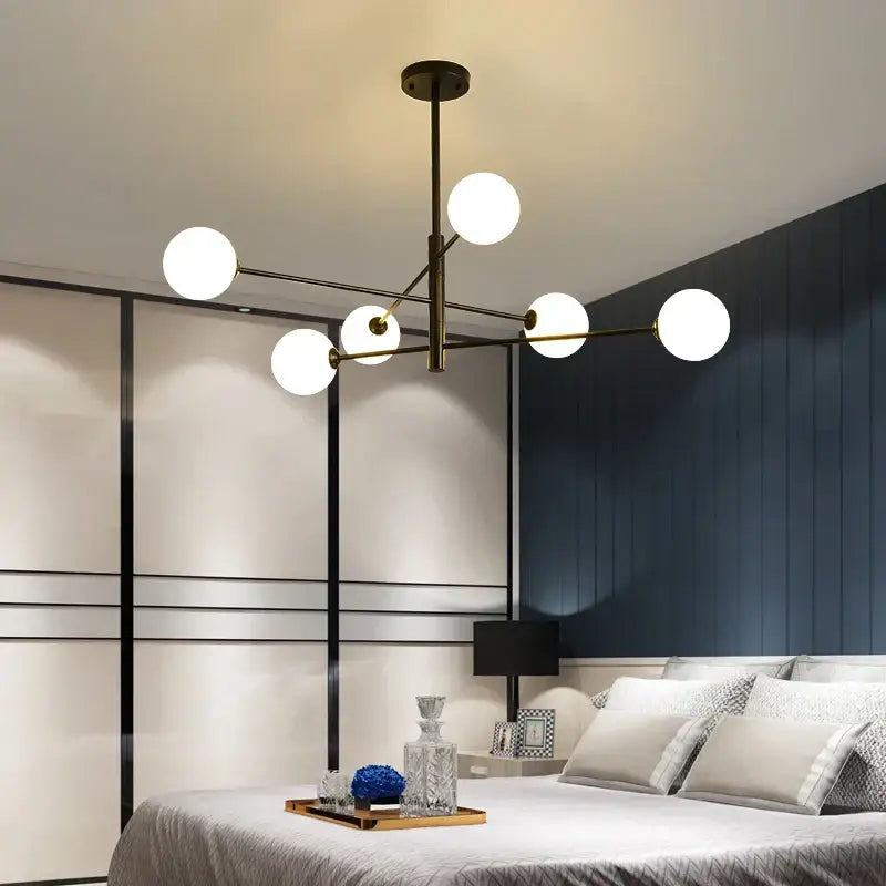 Modern black and gold g9 led chandelier with six white glass globes and brass finish for living room decorbites black gold