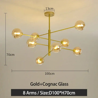 Gold g9 led chandelier with eight arms and cognac glass globes in decorbites black gold finish for living room decor