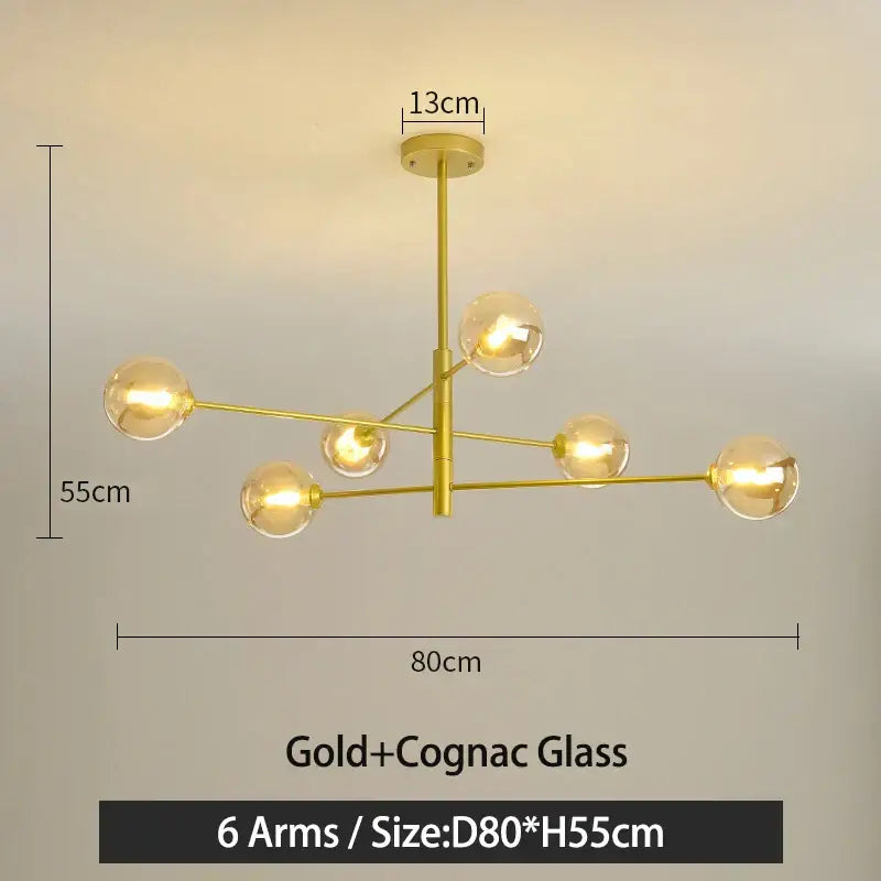 Modern black and gold g9 led chandelier with six gold finished arms and cognac glass globes for living room decorbites black gold