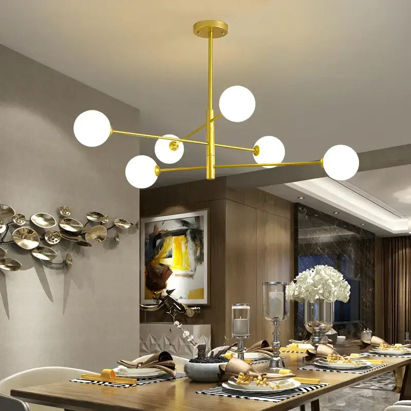 Modern black and gold g9 led chandelier with six gold-toned spherical white glass bulbs for living room decorbites black gold