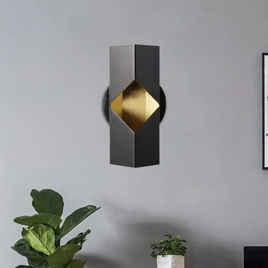 Modern black and gold geometric led sconce with iron shade and sleek 12 inch fixture for bedroom lighting