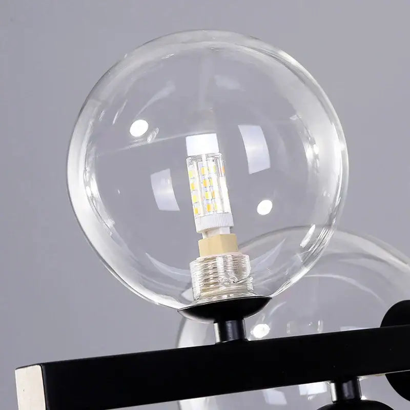 Modern black and gold glass ball led chandelier with clear glass ball gold globe and visible leds for dining room decorbites glass ball