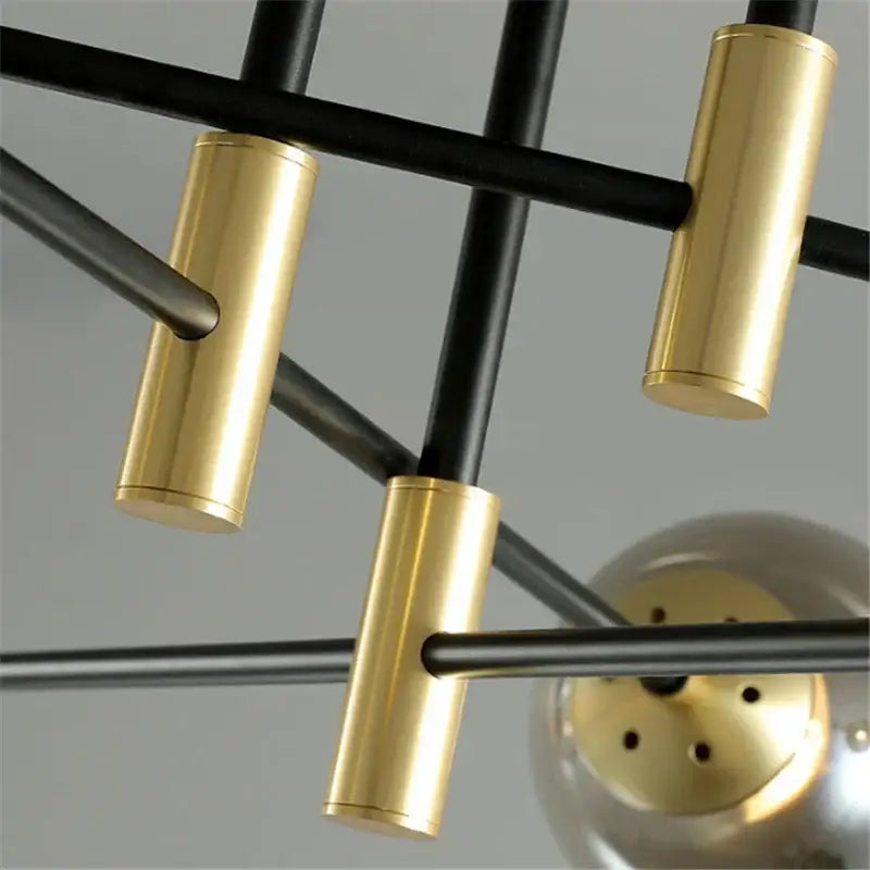 Modern black and gold ball led chandelier with glass ball led and geometric black metal rods for living room decorbites glass ball