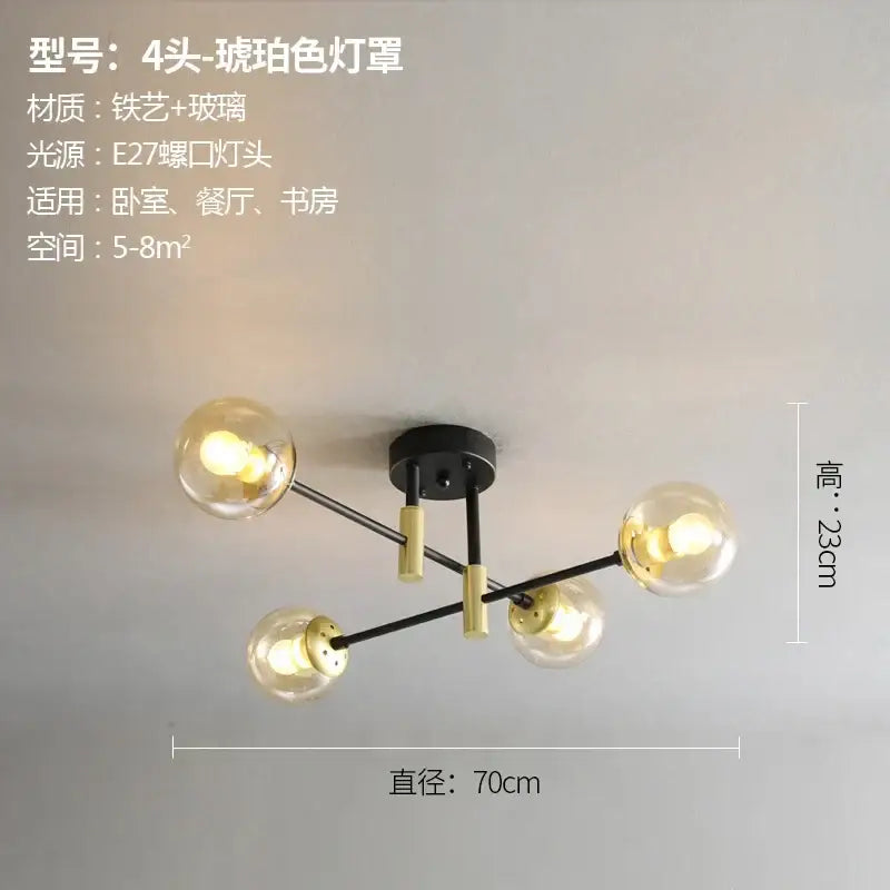 Modern black and gold decorbites glass ball led chandelier with four spherical amber glass bulbs for living room decor