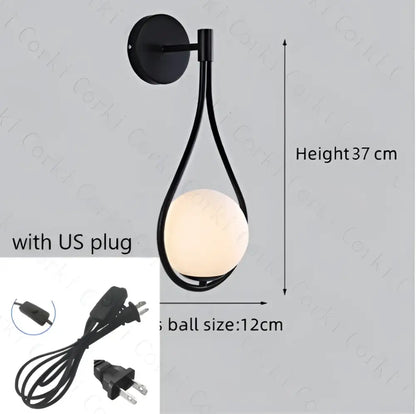 Modern black metal wall lamp with teardrop frame and off-white spherical glass ball led for bedroom decorbites glass ball