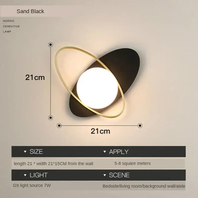 Modern black and gold glass ball led wall lamp with a sand black nordic base and bright white g9 light source for decorbites glass ball