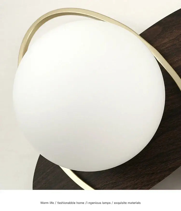 Modern black and gold decorbites glass ball led wall lamp with frosted white spherical shade for bedroom sconce decor