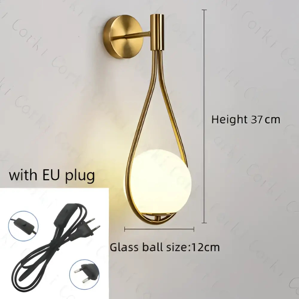 Gold-toned wall lamp with sleek teardrop metal frame and frosted glass globe decorbites glass ball led bedroom sconce
