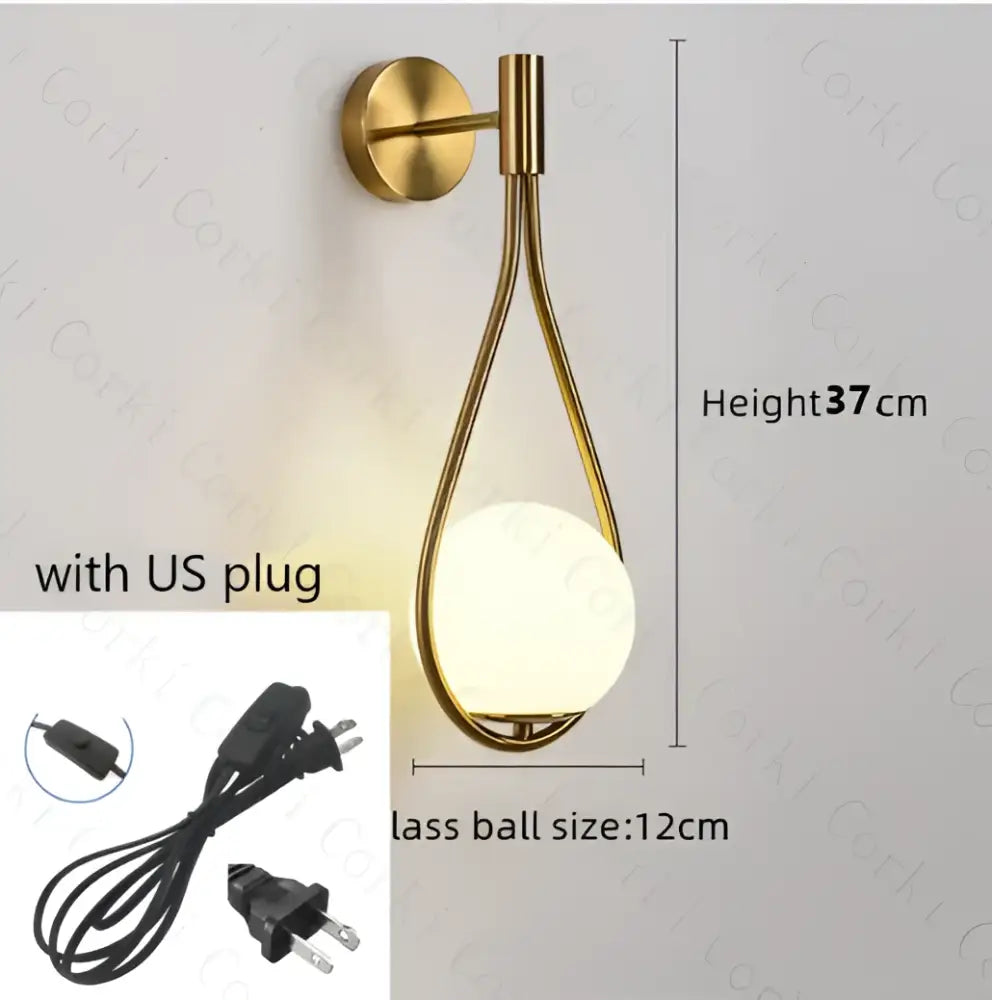 Modern black and gold wall lamp with a gold-toned teardrop frame and illuminated frosted glass ball led decorbites glass ball