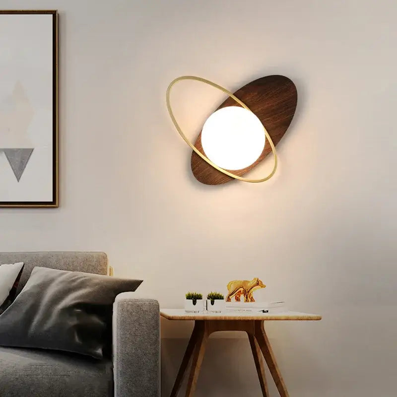 Modern black and gold glass ball led wall lamp with dark wood base and warm glow for bedroom decorbites glass ball lighting