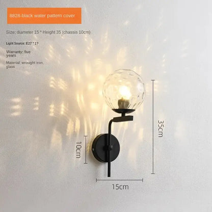 Modern black wrought iron wall lamp with decorbites glass ball led textured faceted globe for bedroom sconce decor