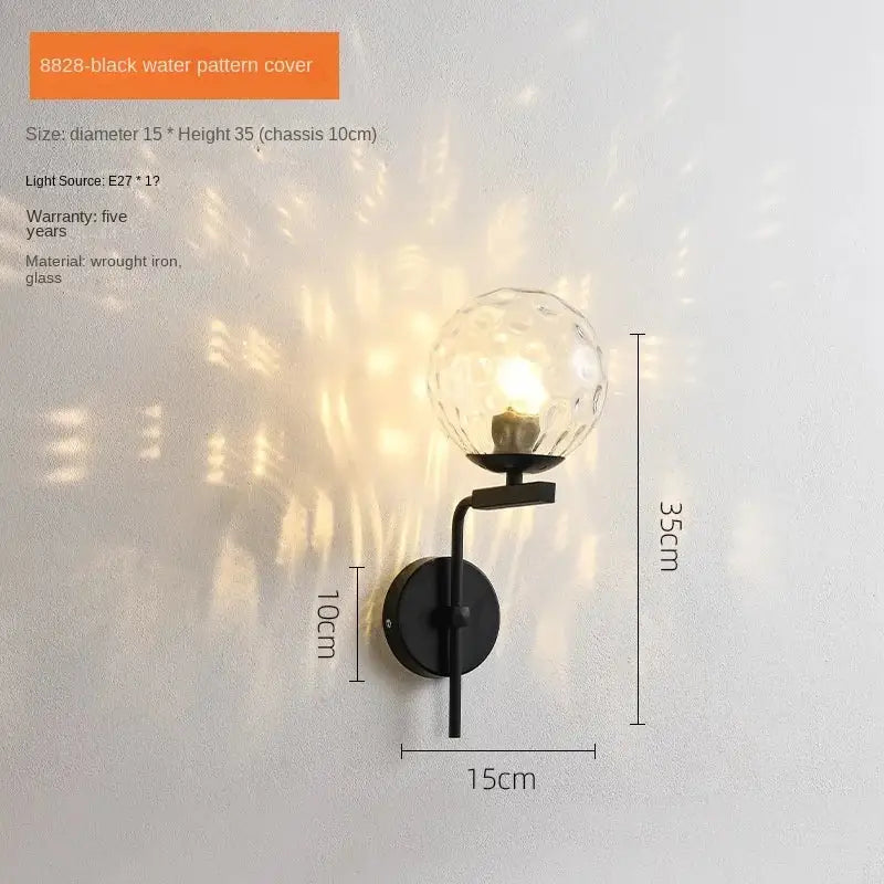Modern black wrought iron wall lamp with decorbites glass ball led textured faceted globe for bedroom sconce decor