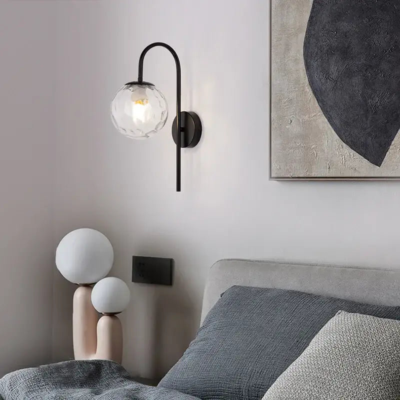 Modern black metal wall sconce with faceted clear glass globe decorbites glass ball led for bedroom decor