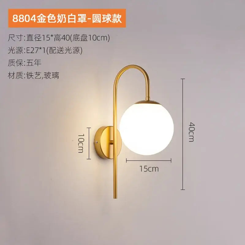 Modern black and gold glass ball led wall light with gold-toned curved arm and frosted white glass ball shade for bedroom decorbites glass ball