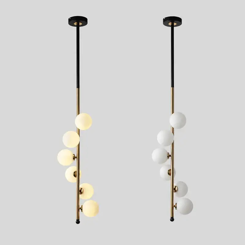 Modern black and gold decorbites glass ball pendant lights with frosted glass spheres for dining room lighting
