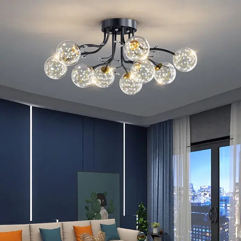 Modern black and gold glass bubble ball ceiling light with clear globe bulbs emitting warm light for living room decorbites ceiling light