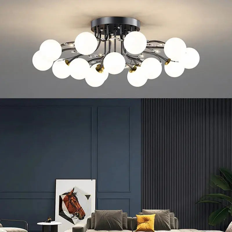 Modern black and gold metal ceiling light with frosted glass bubble ball bulbs in a decorbites glass bubble design