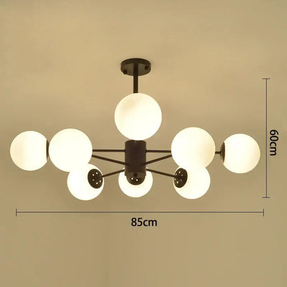 Modern black gold glass pendant light with six frosted globe shades for elegant living room decorbites black gold lighting