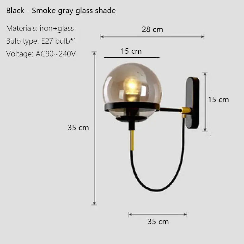 Modern black wall sconce lamp with smoked gray glass globe shade and iron mounting bracket for bedroom lighting