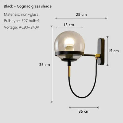 Modern black wall sconce lamp with spherical cognac glass shade and iron frame for bedroom lighting use
