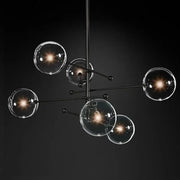 Modern black gold glass led chandelier with clear glass globe shades for living room decorbites black gold style