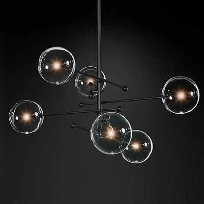 Modern black gold glass led chandelier with clear glass globe shades for living room decorbites black gold style