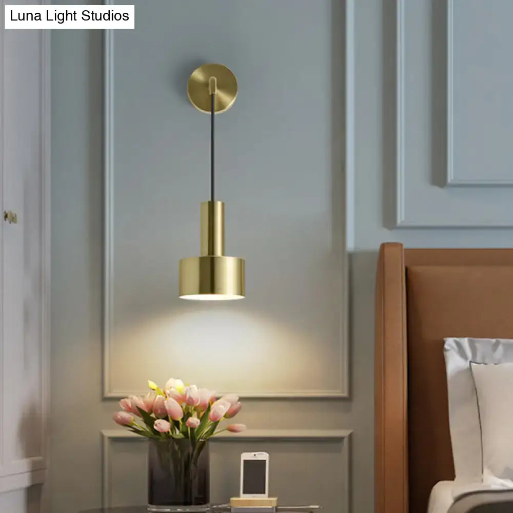Modern black and gold grenade shaped wall lamp with brass finish cylindrical shade for bedroom reading light