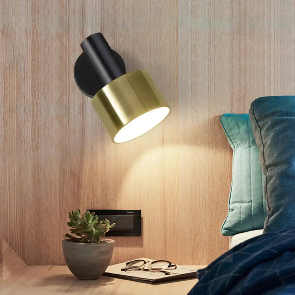 Modern black and gold grenade shaped wall lamp with adjustable arm for bedroom reading light