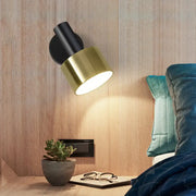 Modern black and gold grenade shaped wall lamp with adjustable arm for bedroom reading light