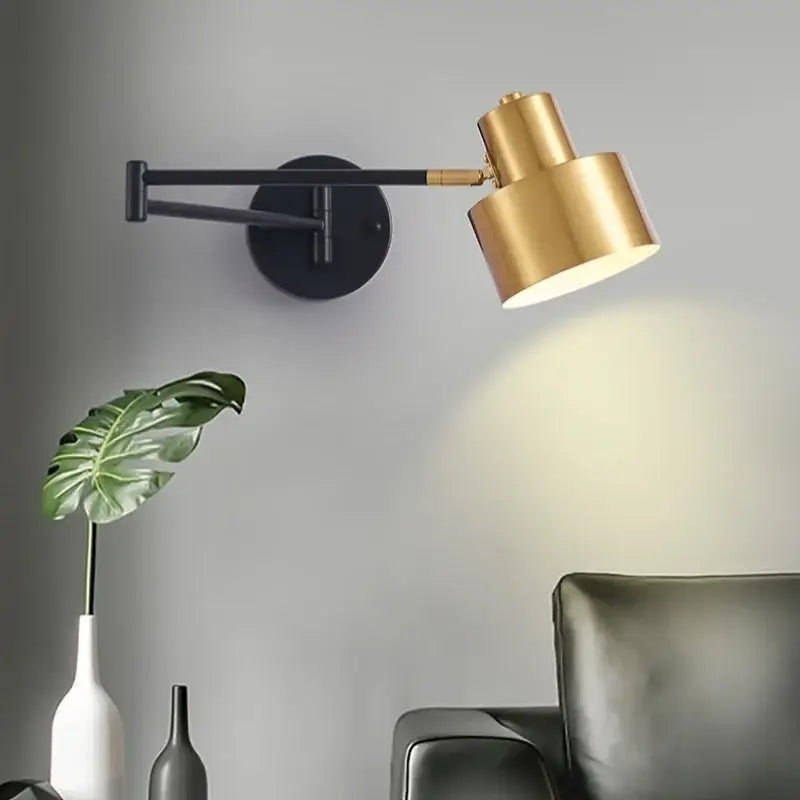 Modern black and gold iron art led wall lamp with gold-toned adjustable arm and matte black base for bedroom decorbites wall lamp