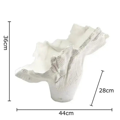 Modern black and gold irregular shape vase with white textured ceramic planter featuring organic leaf-like ridges for decorbites irregular shape decor