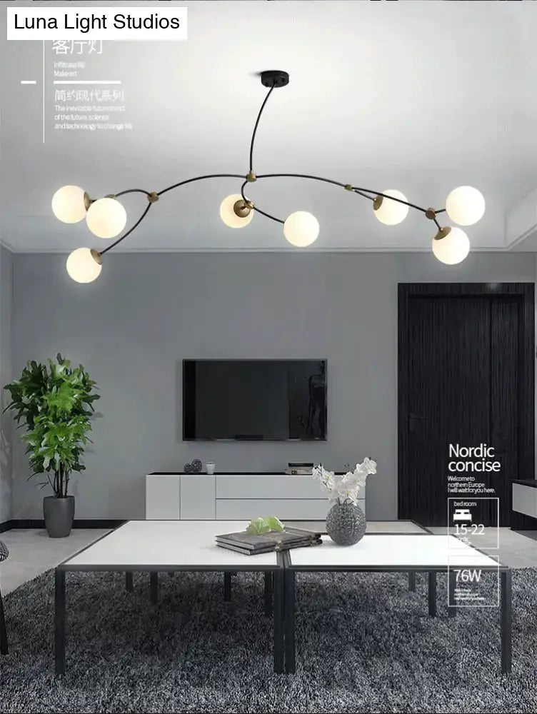 Modern black metal chandelier with nine frosted ball glass shade bulbs for dining room island lighting