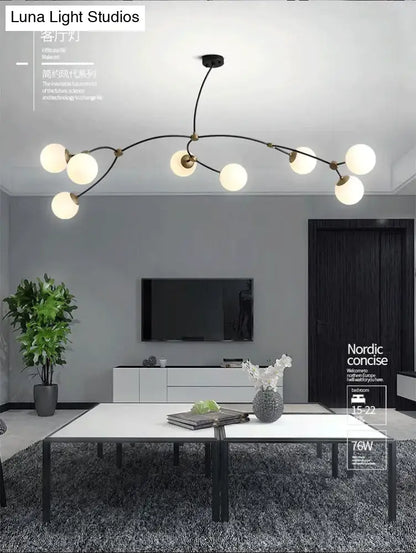 Modern black metal chandelier with nine frosted ball glass shade bulbs for dining room island lighting