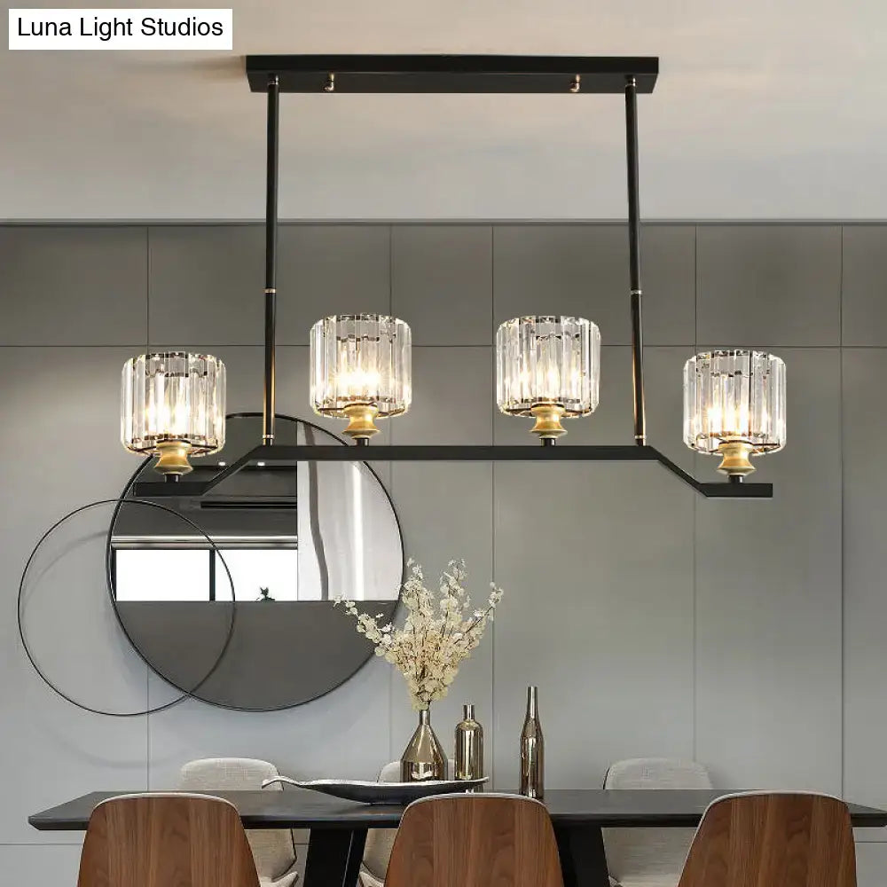 Decorbites™ modern island pendant light with black metal frame, clear crystal cylinder shades, and gold-toned barrel shade shape