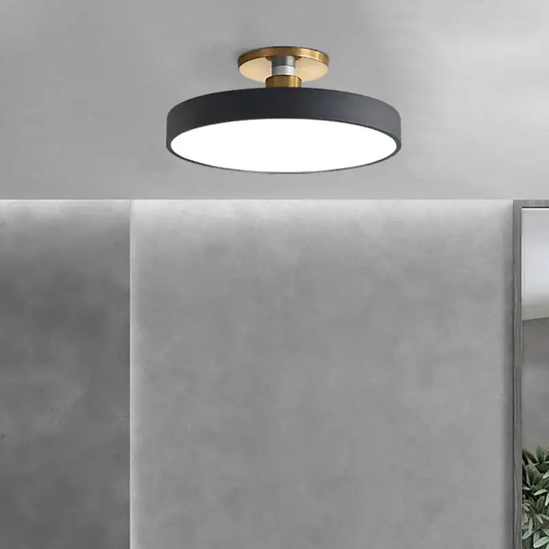 Modern black and gold led ceiling lamp with circular design and gold-toned mounting base for living room decorbites ceiling lamp