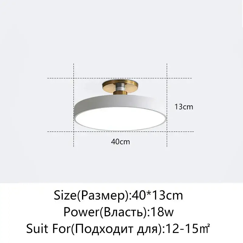 Modern black and gold decorbites led ceiling lamp with white circular light and gold-toned mounting base for living room
