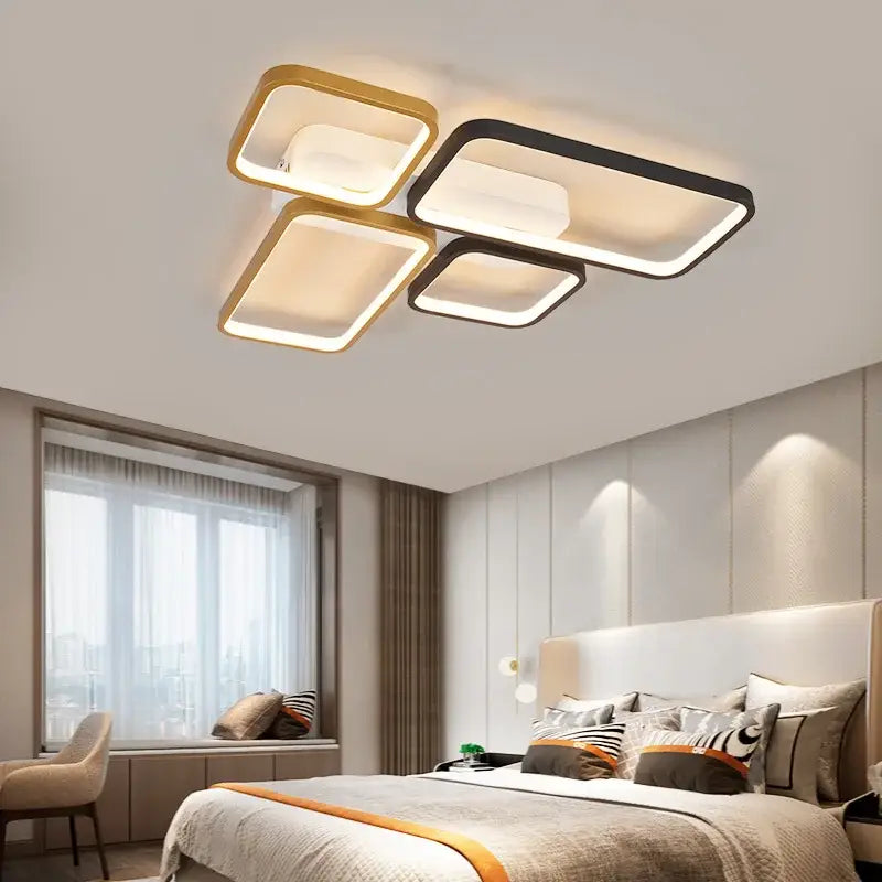 Modern black and gold led chandelier featuring rectangular frames with glowing led panels for living room lighting