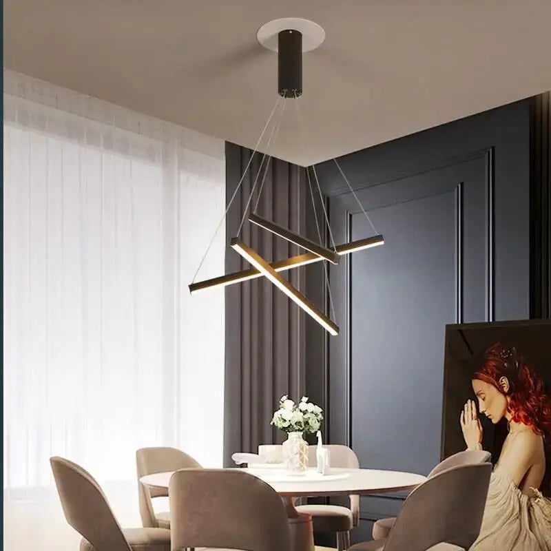 Modern black and gold led chandelier with intersecting light bars suspended for staircase living room decorbites black stair