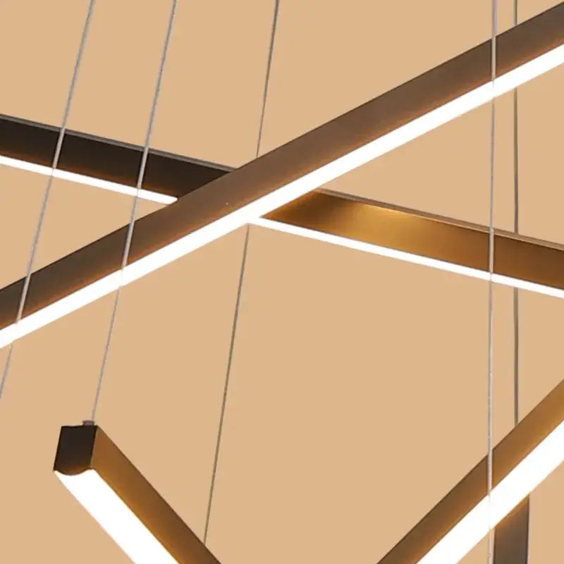 Modern black and gold led chandelier with sleek metal frames and bright white led strips for decorbites black stair lighting