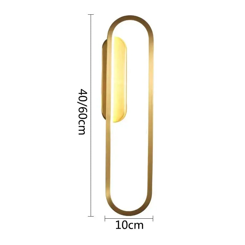 Modern black and gold led indoor wall light with gold-toned oval frame by decorbites for living room decor