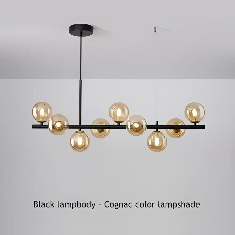 Modern black led pendant chandelier with gold accents and multiple spherical cognac glass lampshades for living room