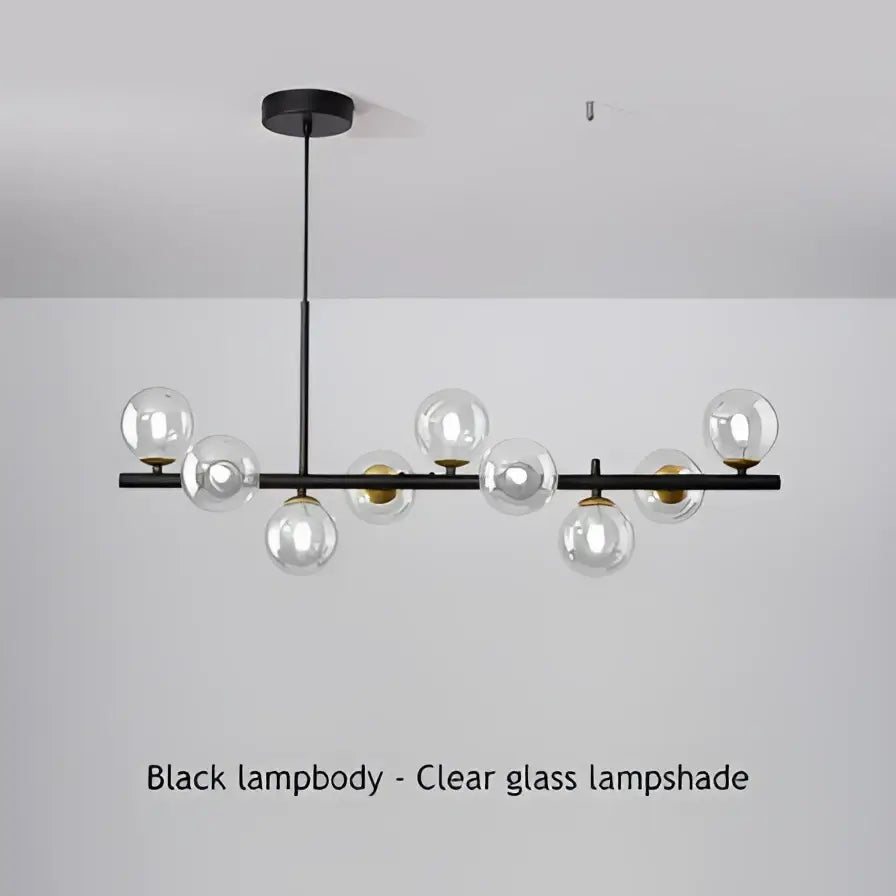 Modern black and gold led pendant chandelier with clear glass globe shades for living room featuring black led pendant design