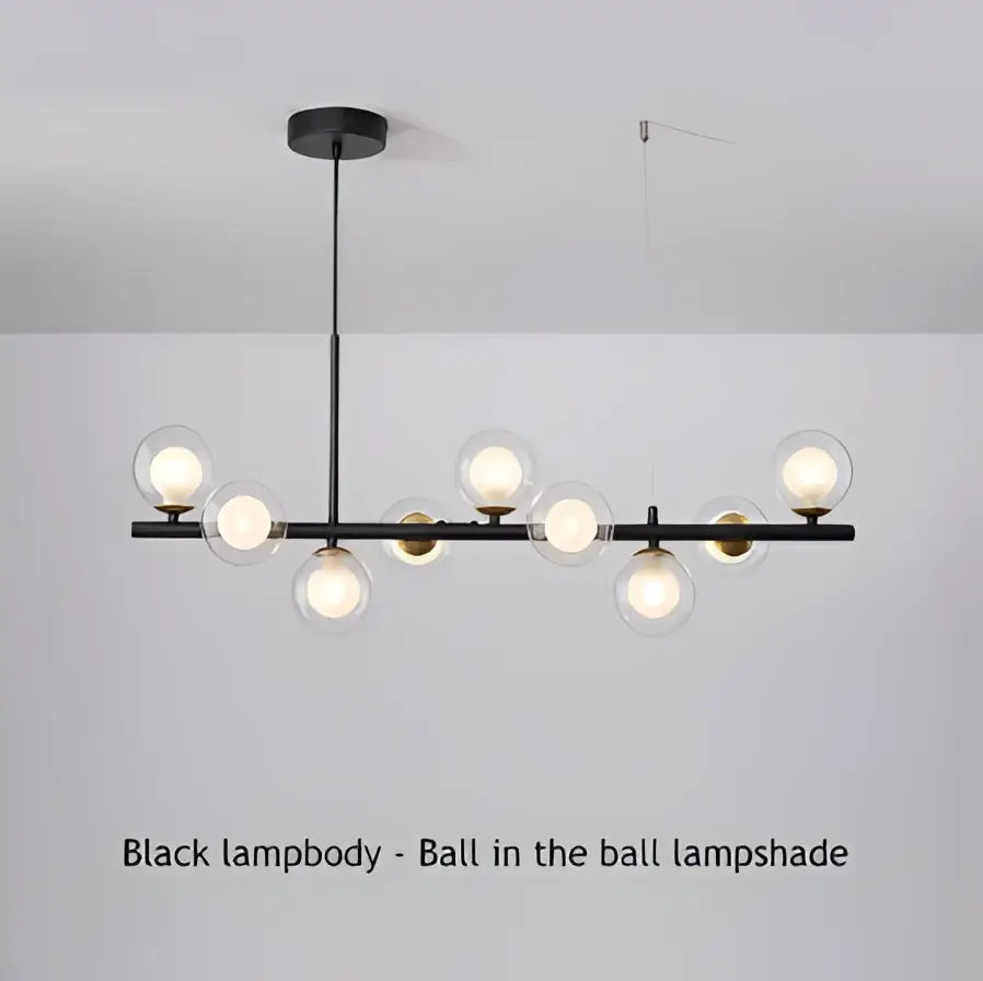 Modern black led pendant chandelier with spherical glass lampshades and gold accents for living room lighting