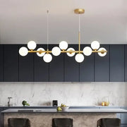 Modern black and gold led pendant chandelier with gold-toned linear design and frosted glass globe bulbs for living room