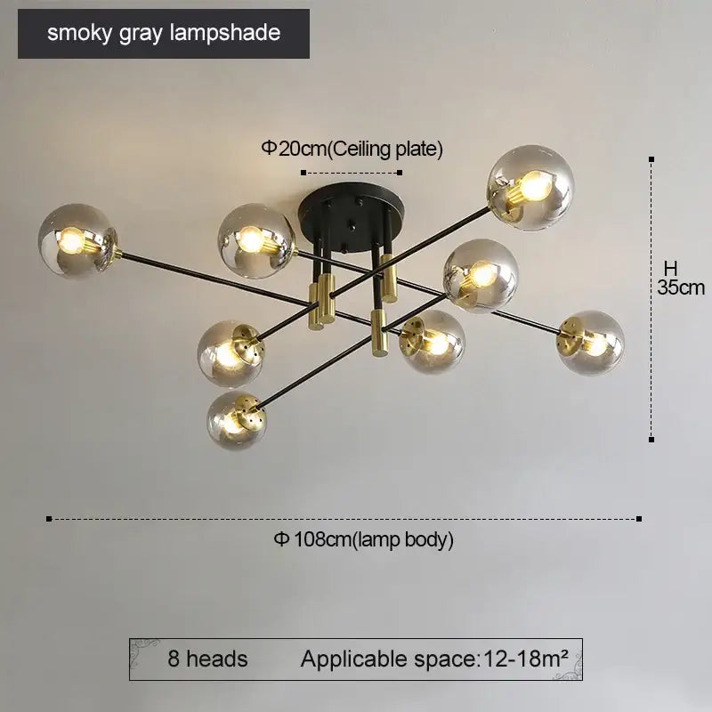 Modern black and gold led round ball chandelier with eight smoky gray glass globes on metal arms for dining room lighting