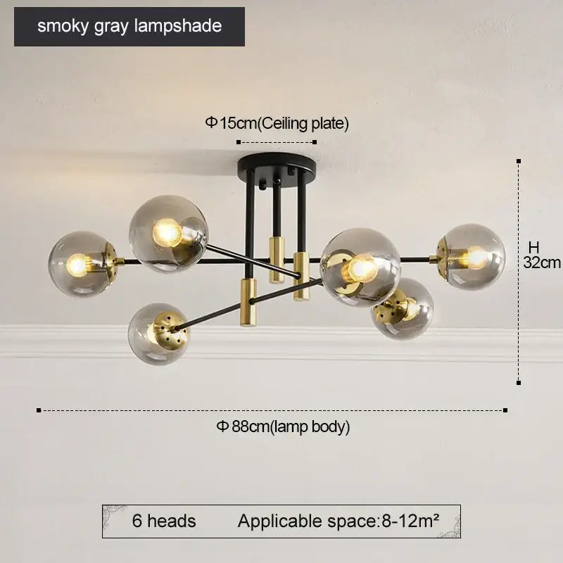 Modern black and gold led round ball chandelier with six smoky gray glass lampshades on metal arms for dining room